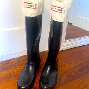 Black tall Hunter rain boots and socks. Only worn twice.